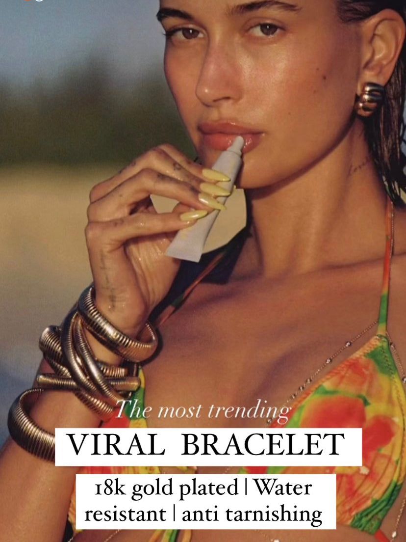 Gold triple coil bracelet