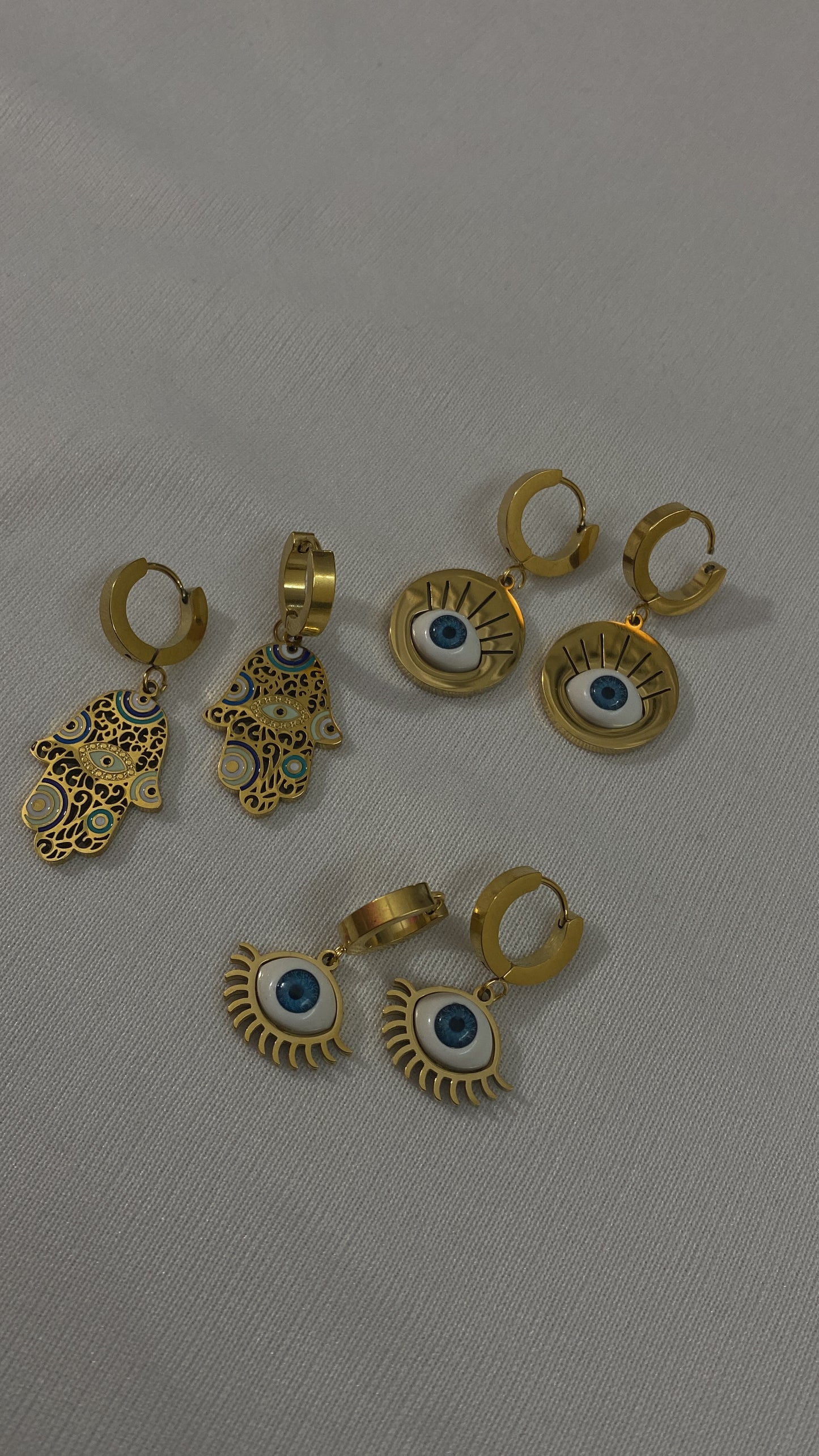 E2 evil eye earrings