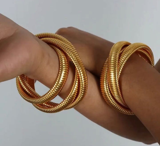 Gold triple coil bracelet